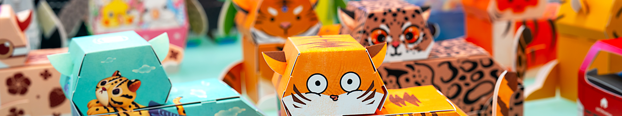 Colorful NTI paper-craft animal packaging figures
